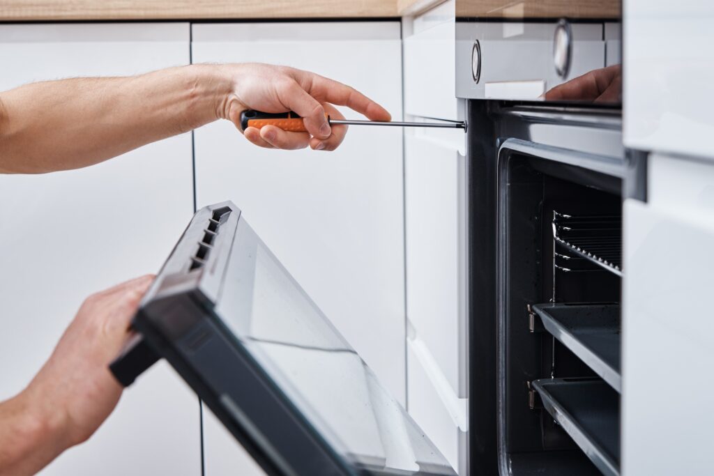 Handyman install oven in the kitchen